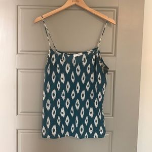 Patterned equipment tank top. Size large.